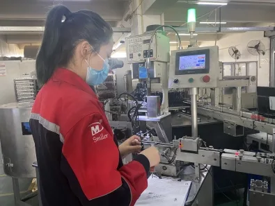 SMILER worker operating equipment, from the company website